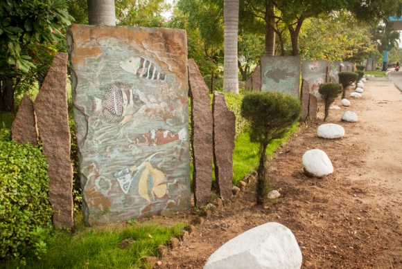 Paintings on stone slabs next to the highway at the entrance of Puducherry